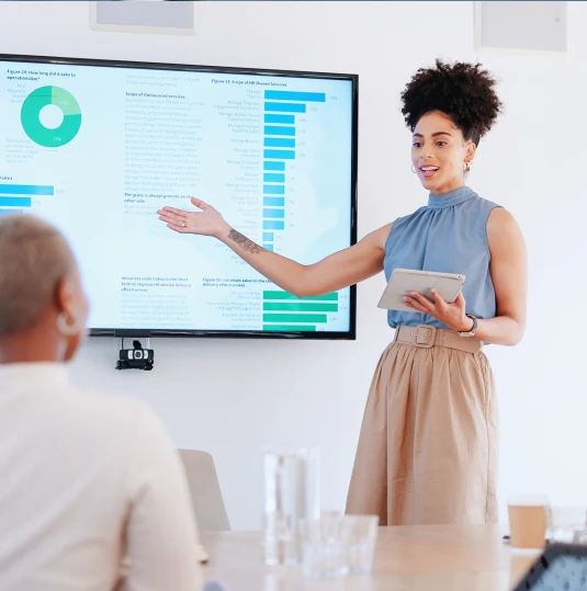 woman presenting graphs